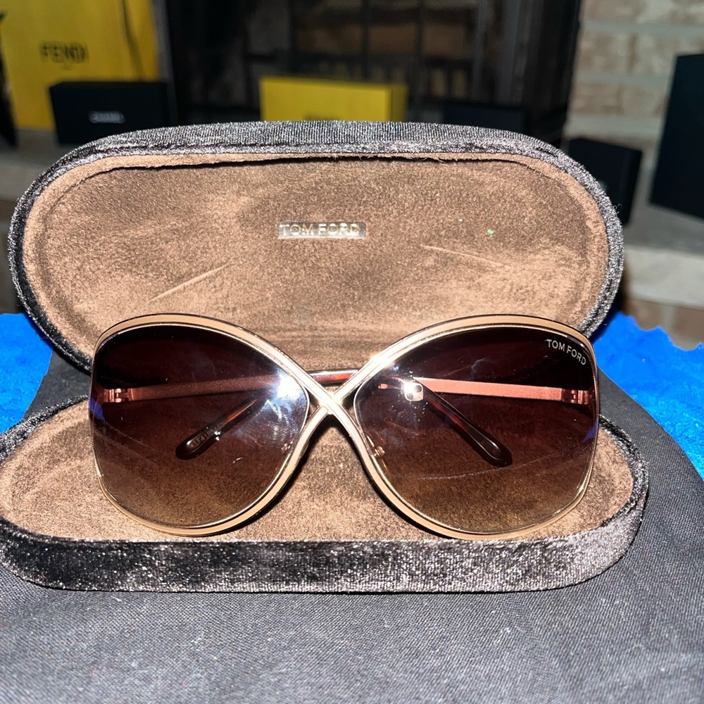 - [ ] Tom ford brown lens with gold authentic